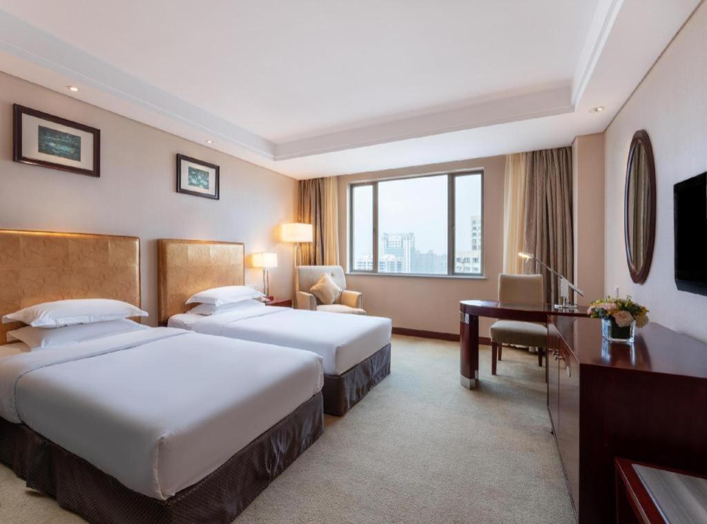 Maison New Century Hotel Ningbo Exteriör bild